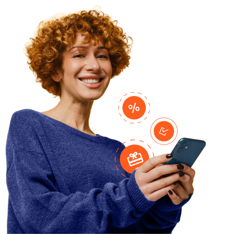 A smiling woman checks her discount cards on her phone